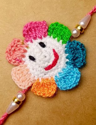 Handmade Crochet Smiley Flower Rakhi